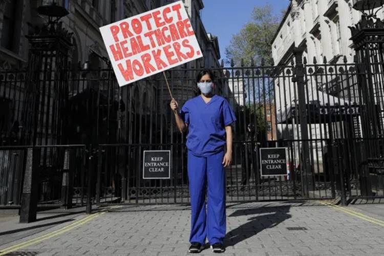 covid 19 indian doctor ppe protest downing street london